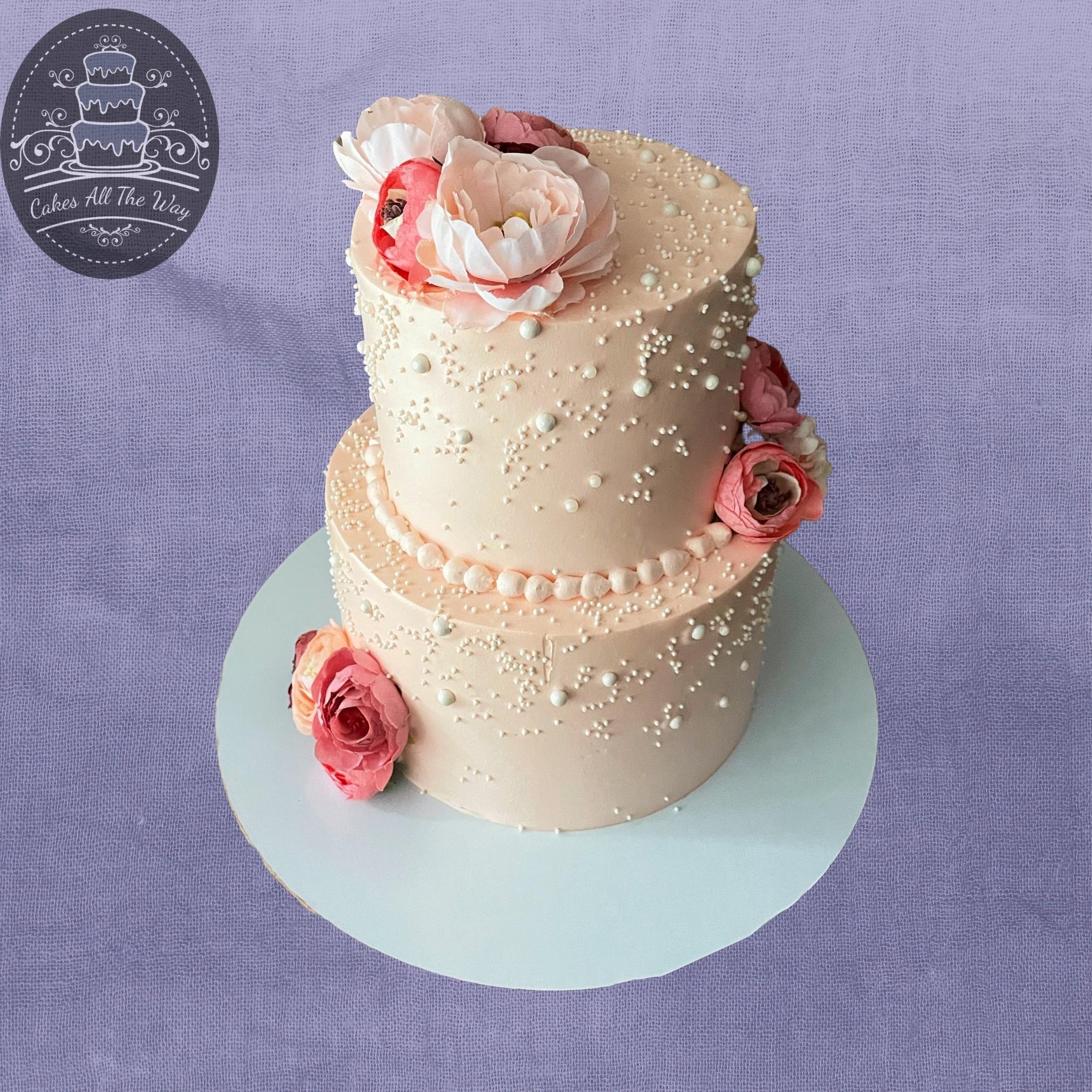 A 2 tier in ivory, gold and dusky pink flowers for Tareque and Mahbuba.  #eastlondonbaker #basrelief… | Pink wedding cake, Tiered wedding cake,  Burgundy wedding cake